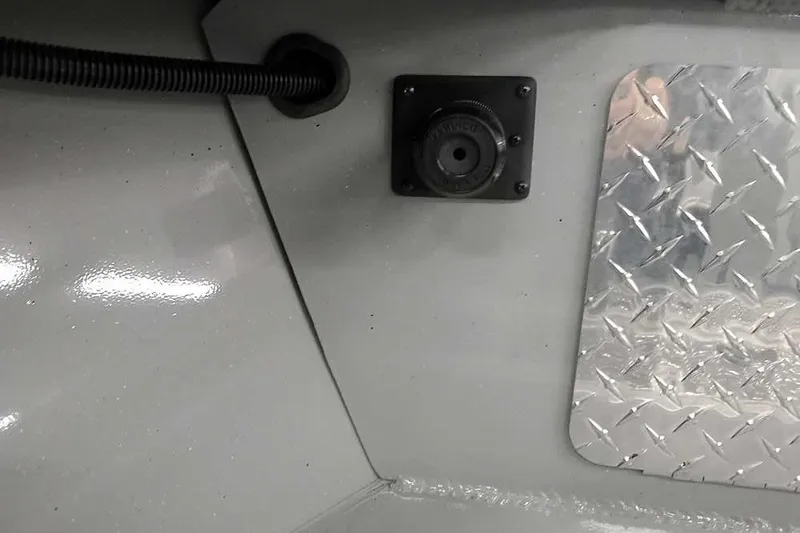 Slide: The Image of Interior detail of 2026 Smoker Craft Phantom 20 X2 with metal panel and wiring. - 16