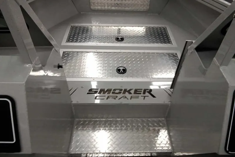 Slide: The Image of 2026 Smoker Craft Phantom 20 X2 boat interior with diamond plate flooring. - 17