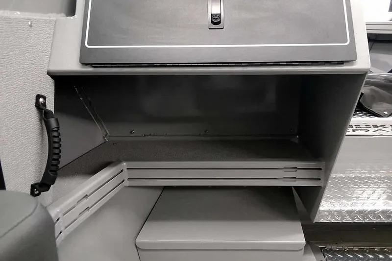 Slide: The Image of 2026 Smoker Craft Phantom 20 X2 interior storage compartment with sleek design and durable materials. - 22