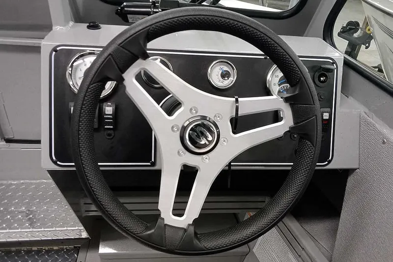 Slide: The Image of Steering wheel and dashboard of 2026 Smoker Craft Phantom 20 X2 boat. - 26