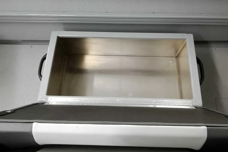 Slide: The Image of 2026 Smoker Craft Phantom 20 X2 boat storage compartment, open and empty. - 31