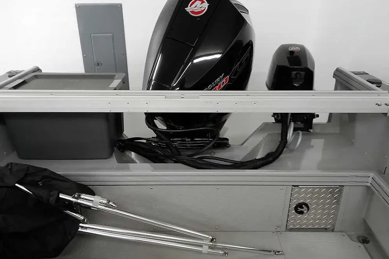 Slide: The Image of 2026 Smoker Craft Phantom 20 X2 boat interior with engine and storage features. - 33