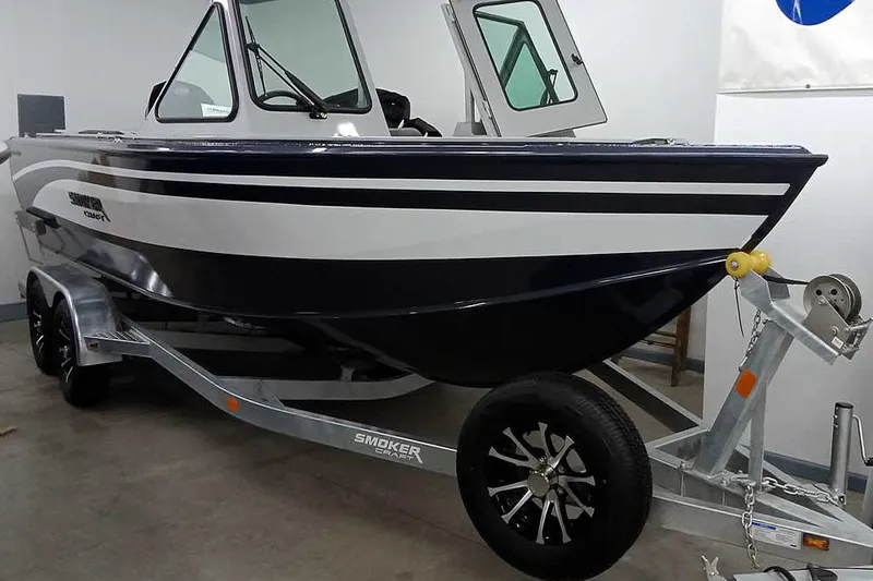 The Image of 2026 Smoker Craft Phantom 20 X2 boat on trailer in showroom. - 7