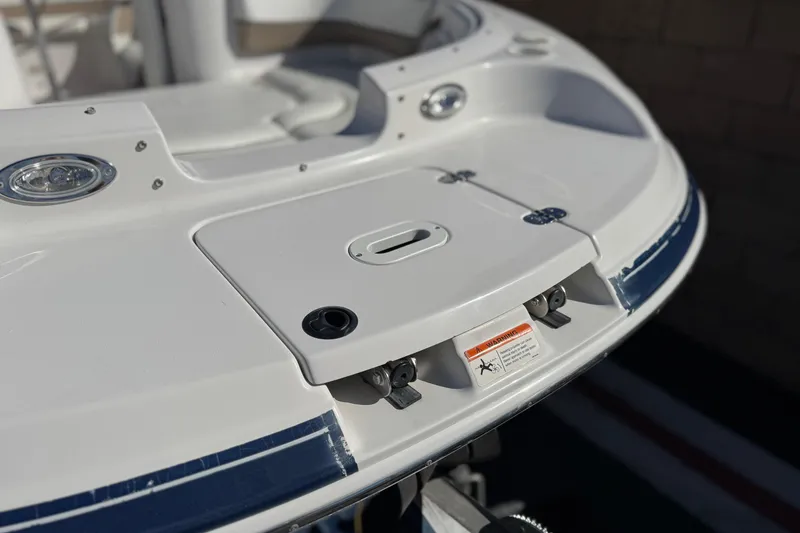 Slide: The Image of 2005 Four Winns 194 Funship boat stern with swim platform and warning label. - 10