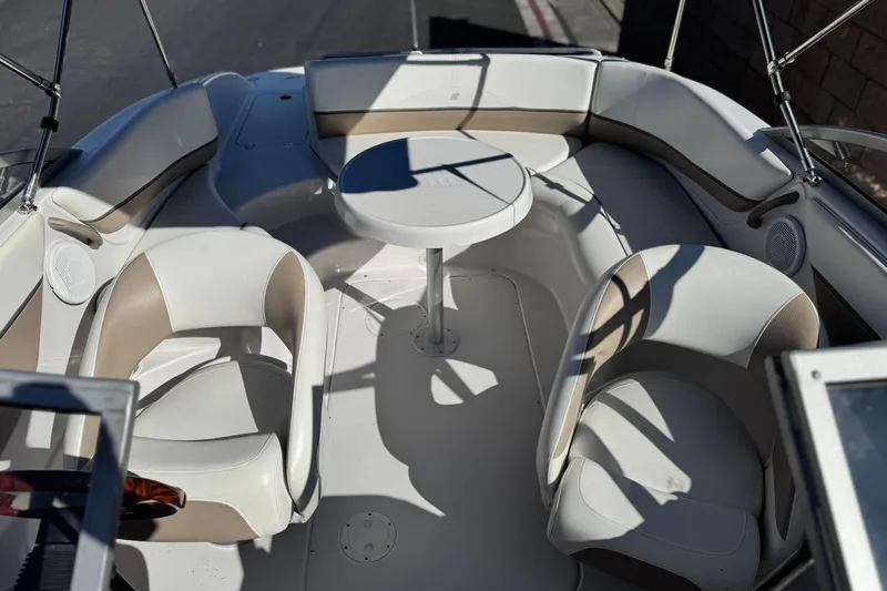 Slide: The Image of 2005 Four Winns 194 Funship boat interior with seating and table. - 17