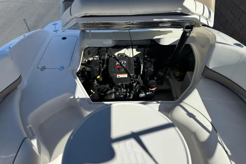 Slide: The Image of 2005 Four Winns 194 Funship boat engine compartment with open hatch. - 20