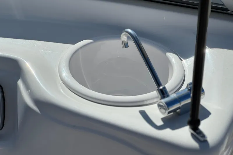 Slide: The Image of 2005 Four Winns 194 Funship boat sink with chrome faucet. - 24