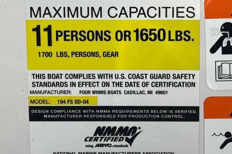 Slide: The Image of 2005 Four Winns 194 Funship capacity label: 11 persons or 1650 lbs, USCG compliant. - 32