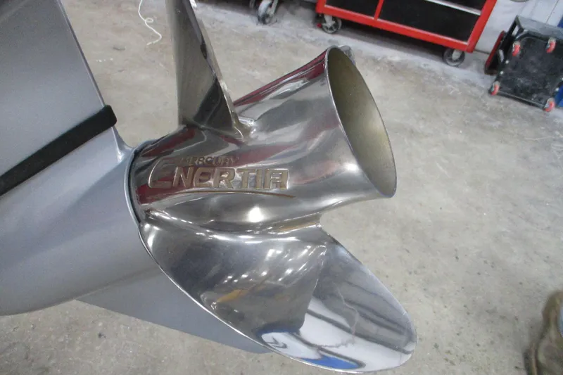 Slide: The Image of Close-up of a Mercury Enertia propeller on a 2025 Tahoe 210 S boat. - 11