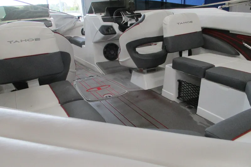 Slide: The Image of 2025 Tahoe 210 S boat interior with modern seating and sleek design. - 5