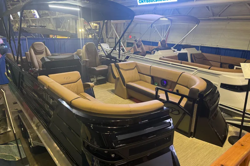 Slide: The Image of 2026 Veranda VX 235 RC luxury pontoon boat with elegant seating at a boat show. - 10