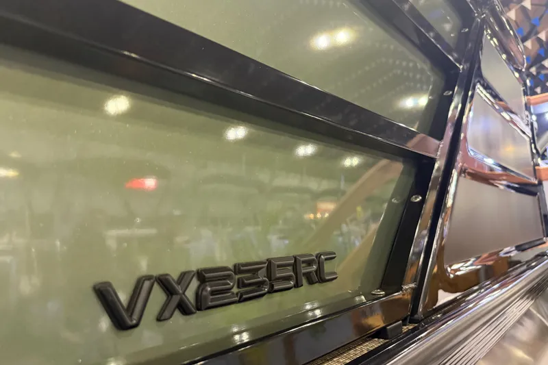 Slide: The Image of 2026 Veranda VX 235 RC boat, close-up of sleek exterior design and model badge. - 14