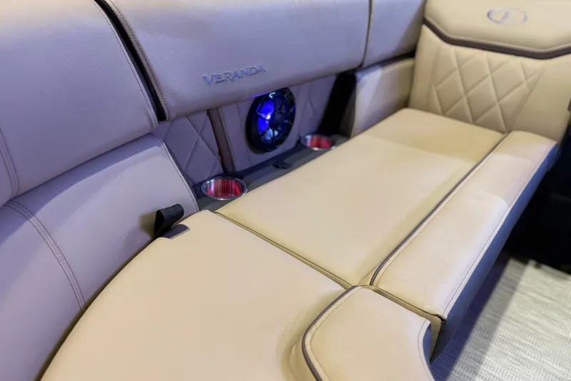 Slide: The Image of Luxurious seating in 2026 Veranda VX 235 RC with cup holders and speaker. - 2