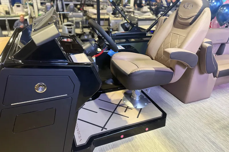 Slide: The Image of Captain's chair and console of 2026 Veranda VX 235 RC boat, featuring luxurious design. - 4