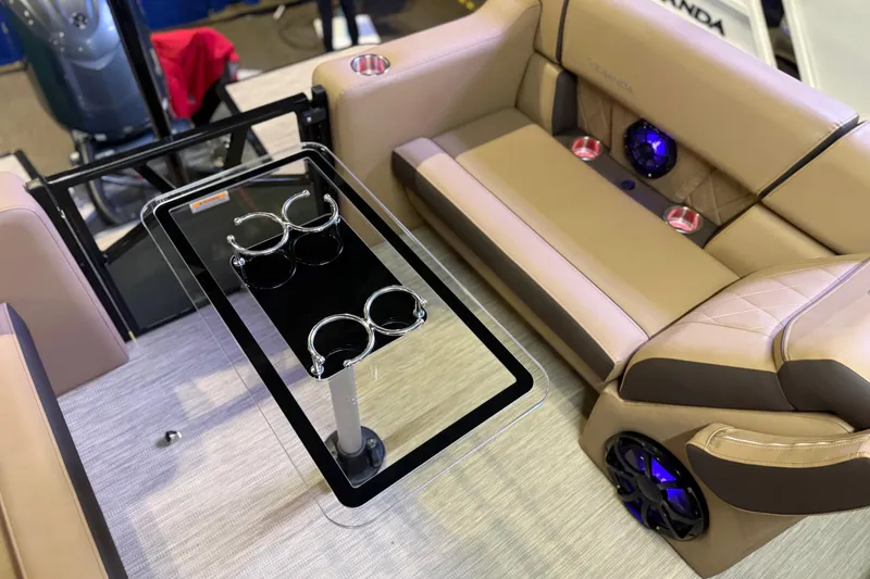 Slide: The Image of Luxurious interior of 2026 Veranda VX 235 RC with plush seating and cup holders. - 7