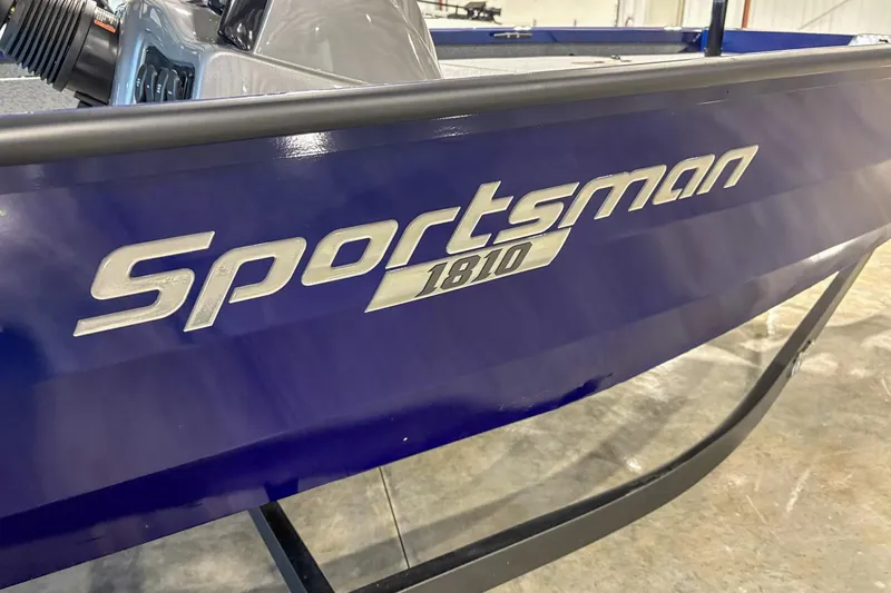 Slide: The Image of 2025 G3 Sportsman 1810 boat, blue exterior with logo detail. - 10