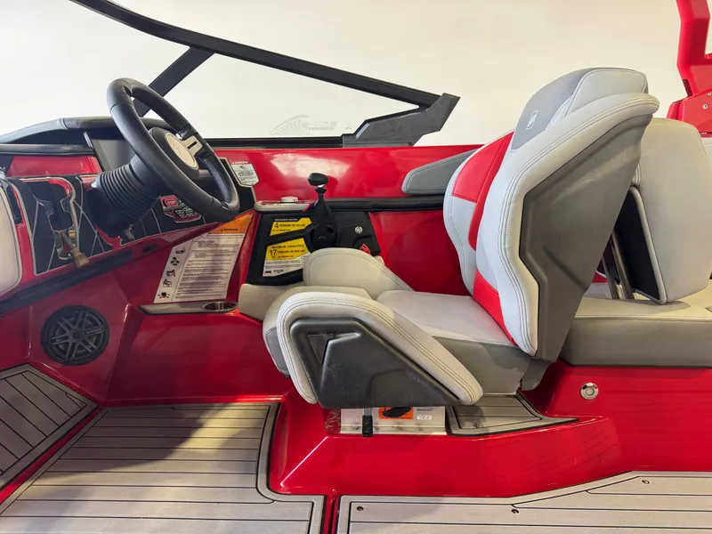 Slide: The Image of Interior of 2020 Nautique Super Air Nautique GS24 boat, red and gray seats. - 23