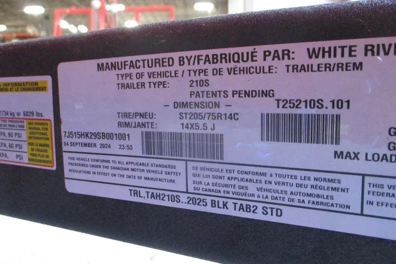 Slide: The Image of Label on 2025 Tahoe 210 S trailer, showing specifications and manufacturing details. - 6