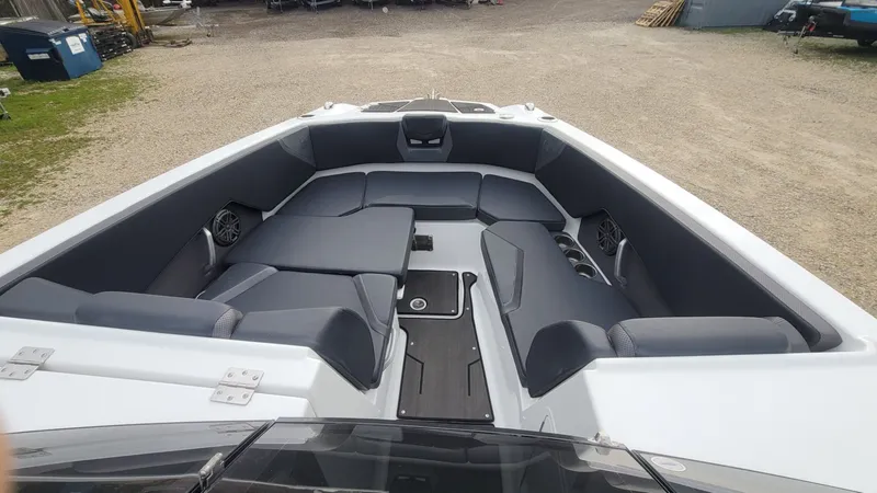 Slide: The Image of Interior of 2023 Scarab 285 ID boat with gray seating. - 14
