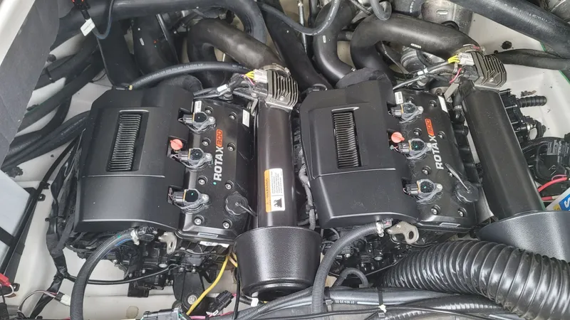 Slide: The Image of Engine compartment of 2023 Scarab 285 ID with Rotax 300 engines. - 15