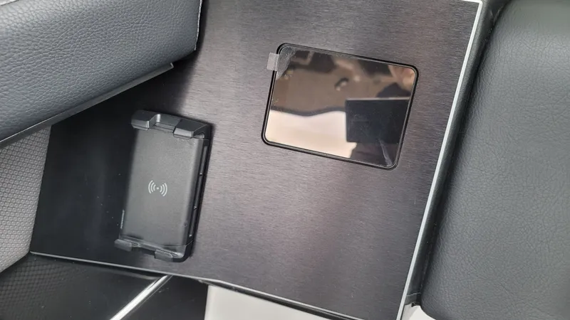 Slide: The Image of Interior of 2023 Scarab 285 ID with charger. - 17