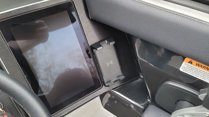 Slide: The Image of Interior of 2023 Scarab 285 ID with display and charger. - 18