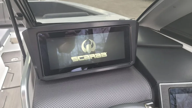 Slide: The Image of 2023 Scarab 285 ID boat display with logo. - 19