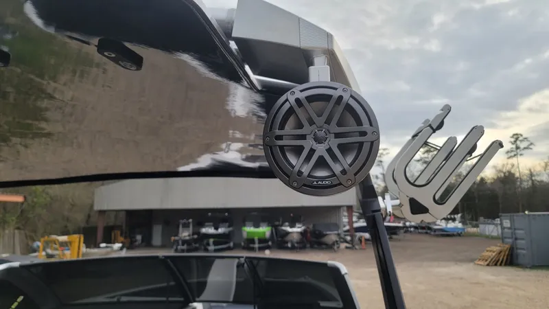 Slide: The Image of 2023 Scarab 285 ID boat with JL Audio speaker. - 21