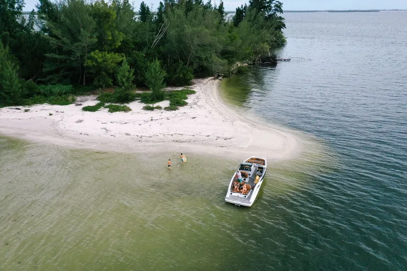 Slide: The Image of Scarab 285 ID boat at beach, 2023 model. - 39