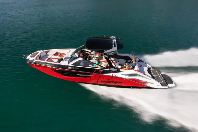 Slide: The Image of 2023 Scarab 285 ID boat speeding on the water. - 48