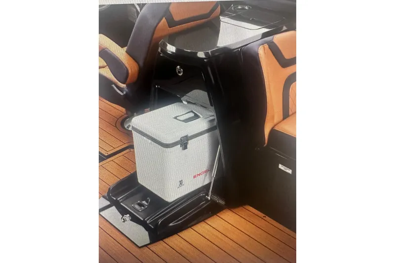 Slide: The Image of 2026 Yamaha Boats 275SD interior with cooler and stylish seating. - 4