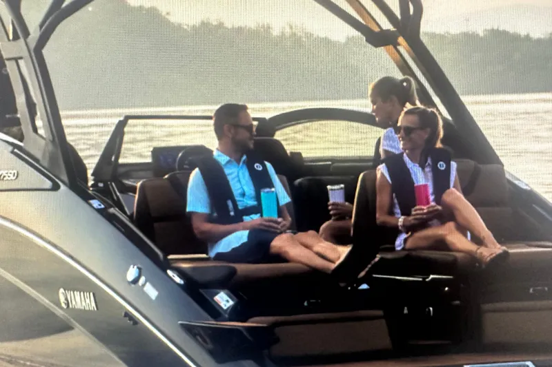 Slide: The Image of 2026 Yamaha Boats 275SD with passengers enjoying a sunny day on the water. - 5