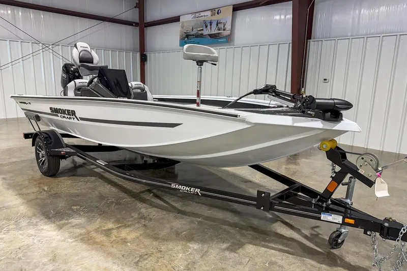 Slide: The Image of 2026 Smoker Craft Viper XR 165 boat on trailer in indoor storage. - 3