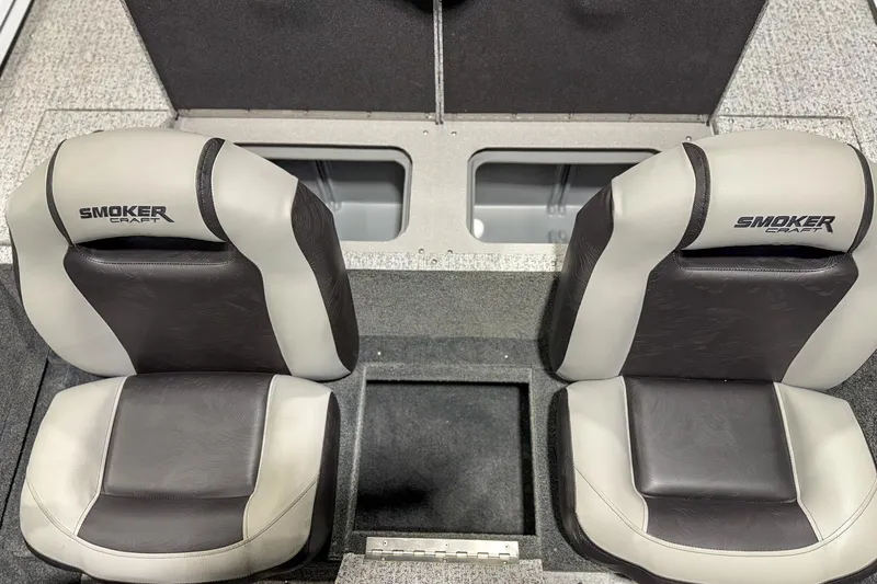 Slide: The Image of 2026 Smoker Craft Viper XR 165 boat seats with storage compartments. - 9