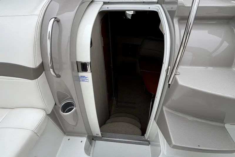 Slide: The Image of 2005 Formula 31 Performance Cruiser cabin entrance with sleek interior design. - 10