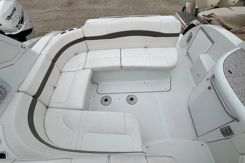 Slide: The Image of 2005 Formula 31 Performance Cruiser interior with white seating and modern design. - 12