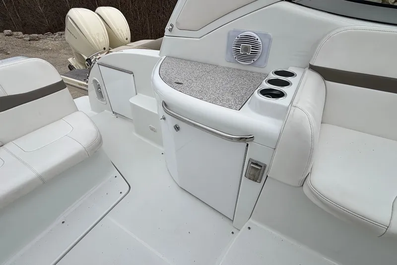 Slide: The Image of 2005 Formula 31 Performance Cruiser interior with seating, storage, and cup holders. - 13