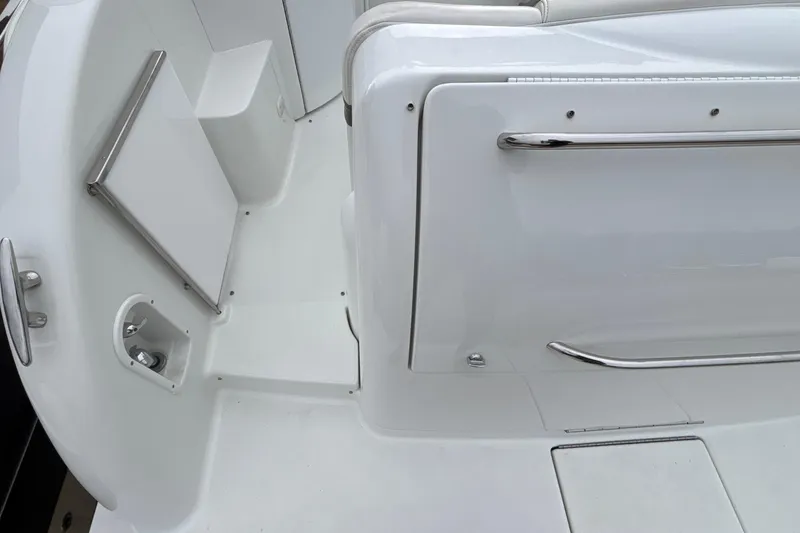 Slide: The Image of 2005 Formula 31 Performance Cruiser interior with white seating and chrome accents. - 22