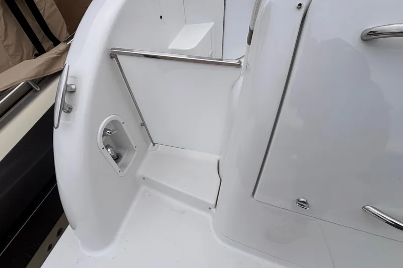 Slide: The Image of 2005 Formula 31 Performance Cruiser deck with stainless steel railings and clean white finish. - 24