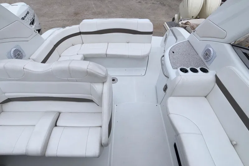 Slide: The Image of 2005 Formula 31 Performance Cruiser interior with white seating and cup holders. - 34