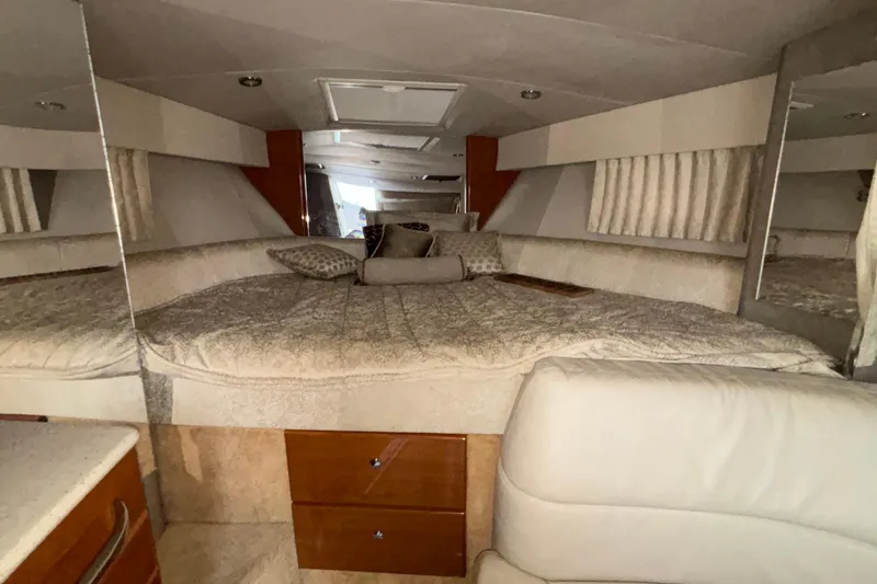 Slide: The Image of Interior of 2005 Formula 31 Performance Cruiser with cozy bed and elegant decor. - 35