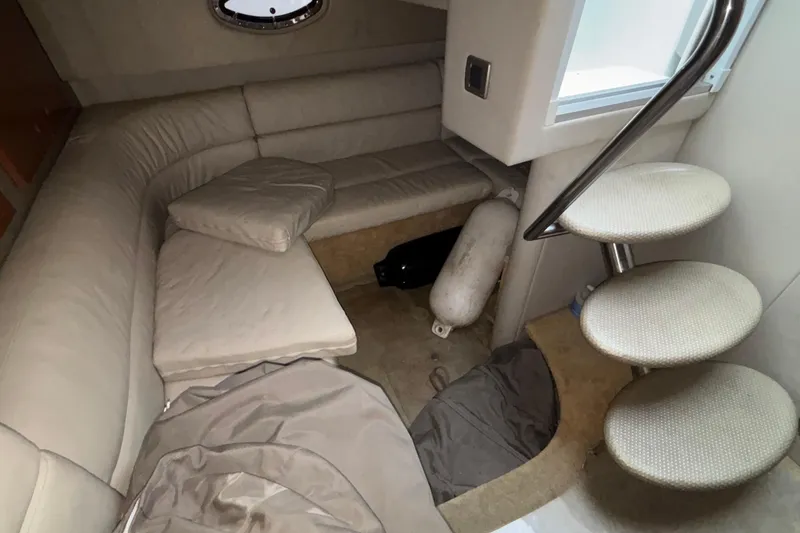 Slide: The Image of Interior of 2005 Formula 31 Performance Cruiser with beige seating and spiral staircase. - 42