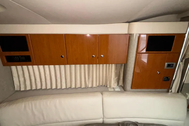 Slide: The Image of Interior of 2005 Formula 31 Performance Cruiser with wood cabinets and beige seating. - 43