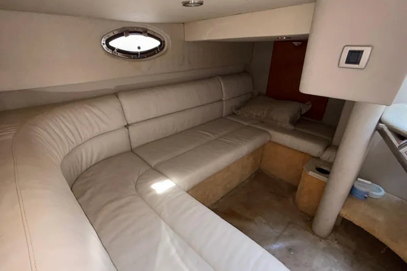Slide: The Image of Interior of 2005 Formula 31 Performance Cruiser with beige leather seating. - 57