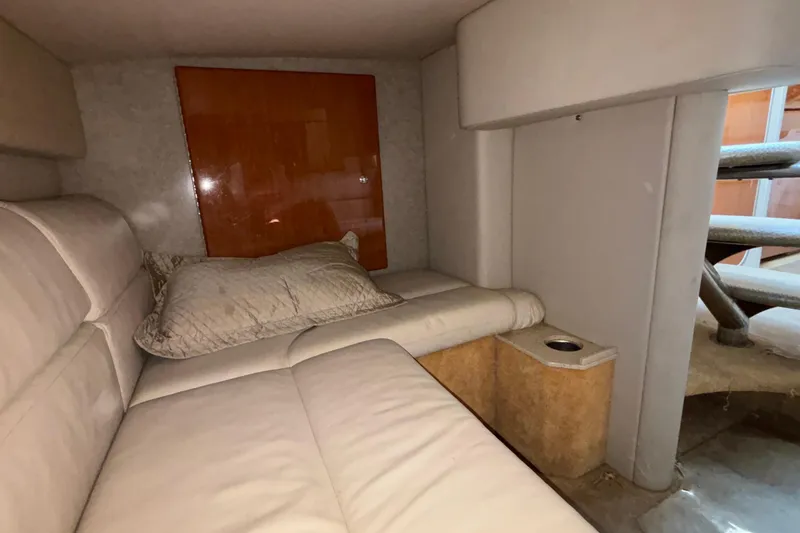 Slide: The Image of Interior of 2005 Formula 31 Performance Cruiser with beige seating and wooden accents. - 58