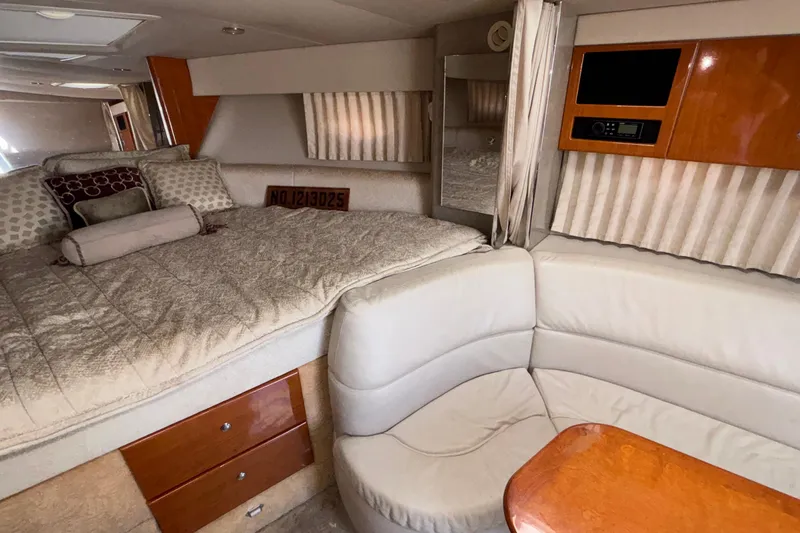 Slide: The Image of Interior of a 2005 Formula 31 Performance Cruiser with cozy bed and seating area. - 63