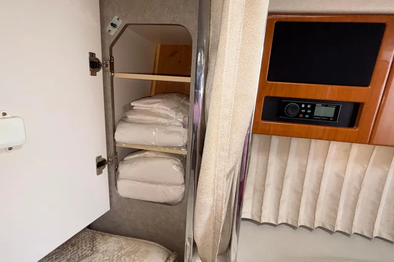 Slide: The Image of Interior of 2005 Formula 31 Performance Cruiser with storage and control panel. - 66