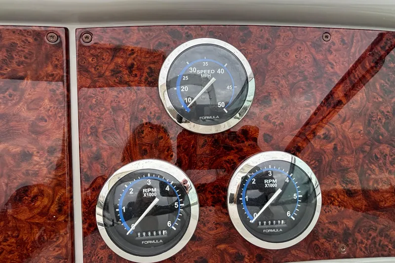 Slide: The Image of Dashboard of 2005 Formula 31 Performance Cruiser with speedometer and RPM gauges. - 9