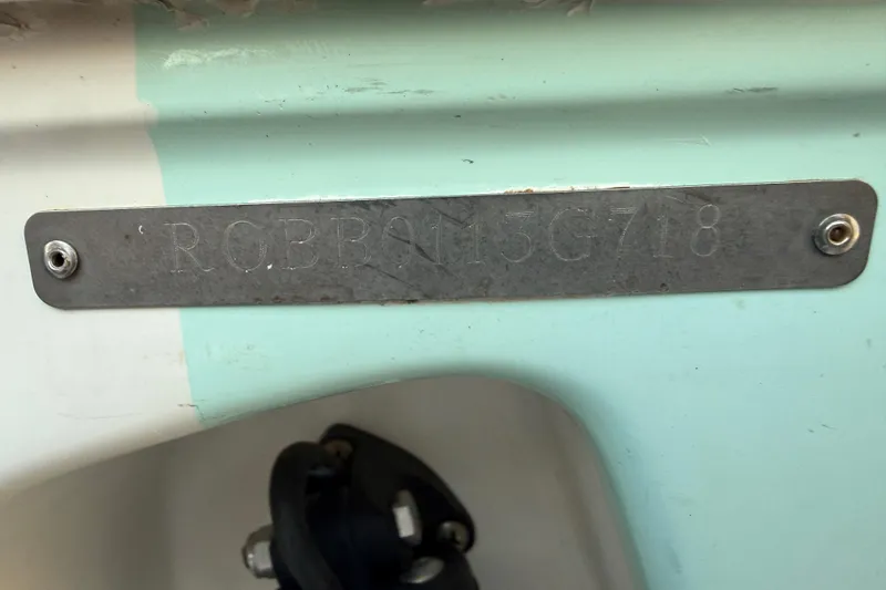 Slide: The Image of 2018 Robalo R242 Center Console boat identification plate. - 22