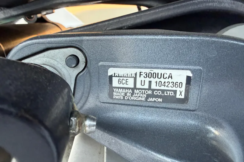Slide: The Image of Yamaha F300UCA engine label on 2018 Robalo R242 Center Console boat. - 23